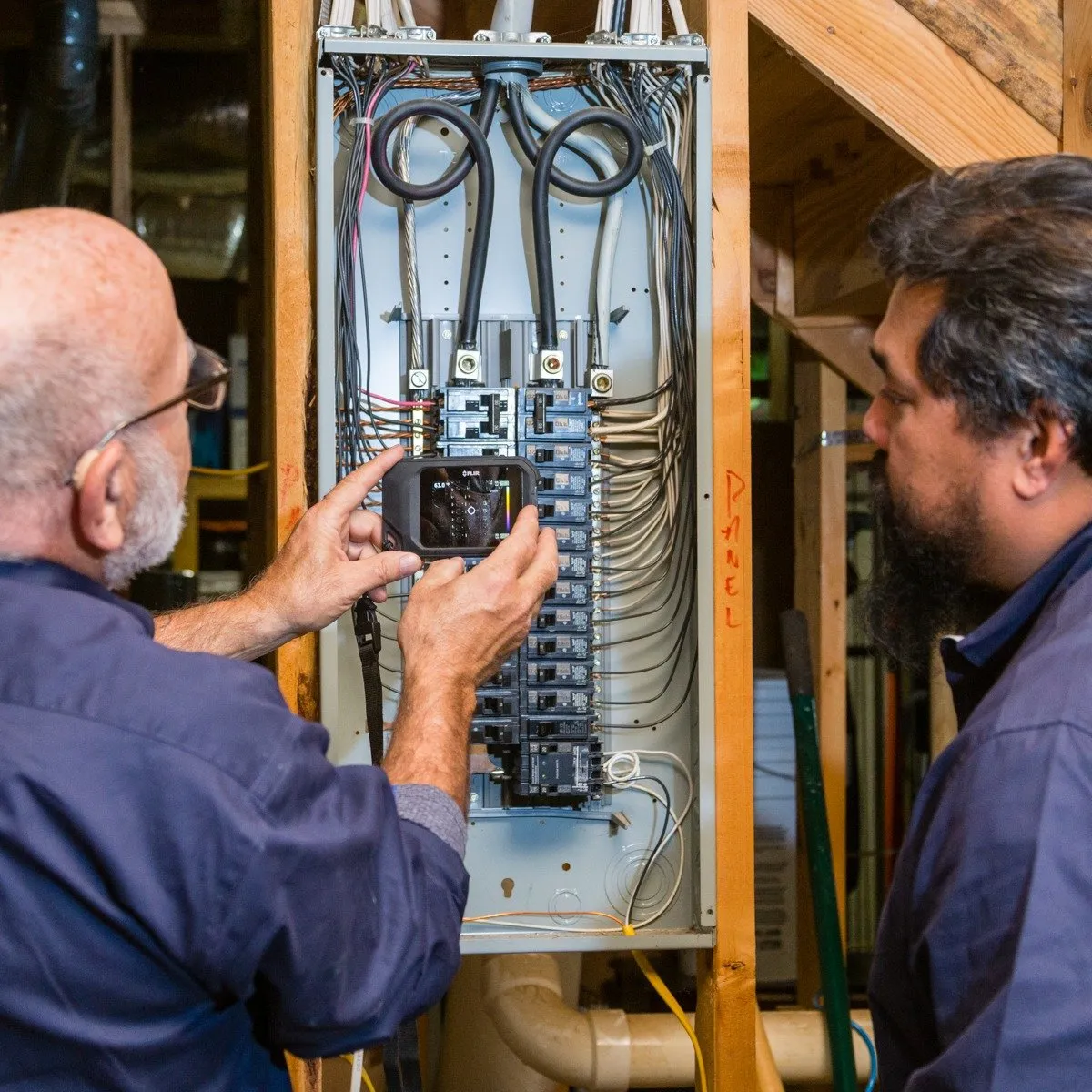 inspecting a fuse box